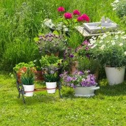 Relaxdays blomsterbänk, gjutjärn och trä, växtstöd för blomkrukor, olika dimensioner, brun/grön-grå