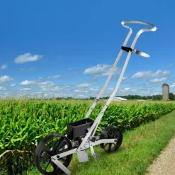 Trädgårdssåmaskin i metall, med 6 fröplattor, manuell radsådd för gräsfrön och bakgårdsjordbruk.